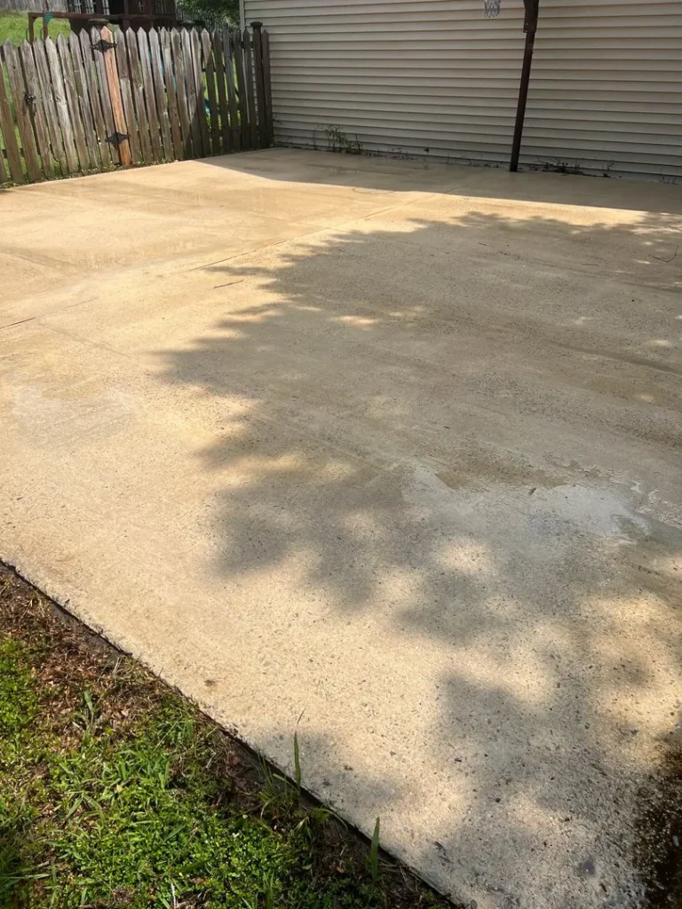 Concrete cleaning service for residential driveway