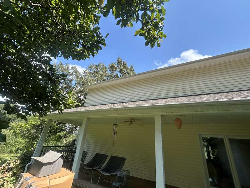 Clean house porch and siding after soft washing in Algood TN