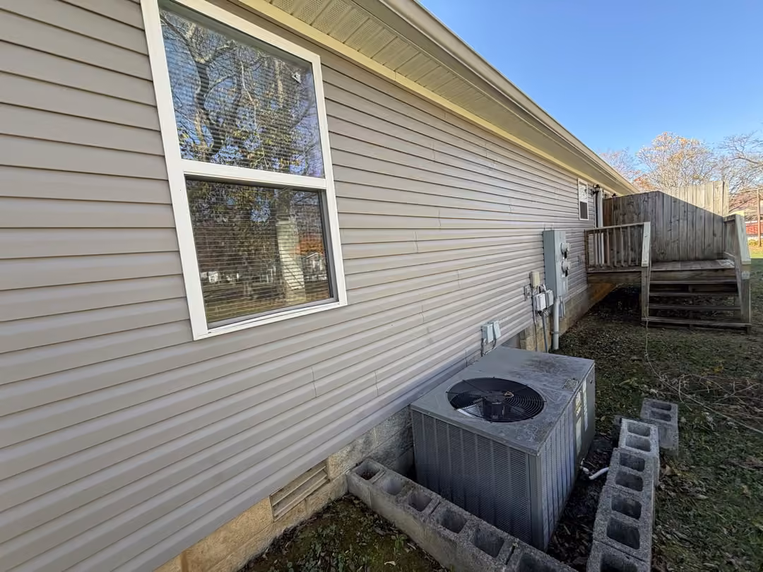 Clean siding after soft wash in Baxter, TN