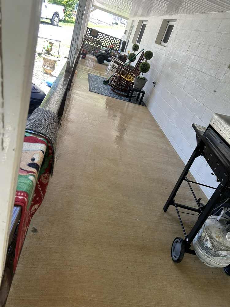 Long concrete patio walkway after pressure washing in Livingston TN